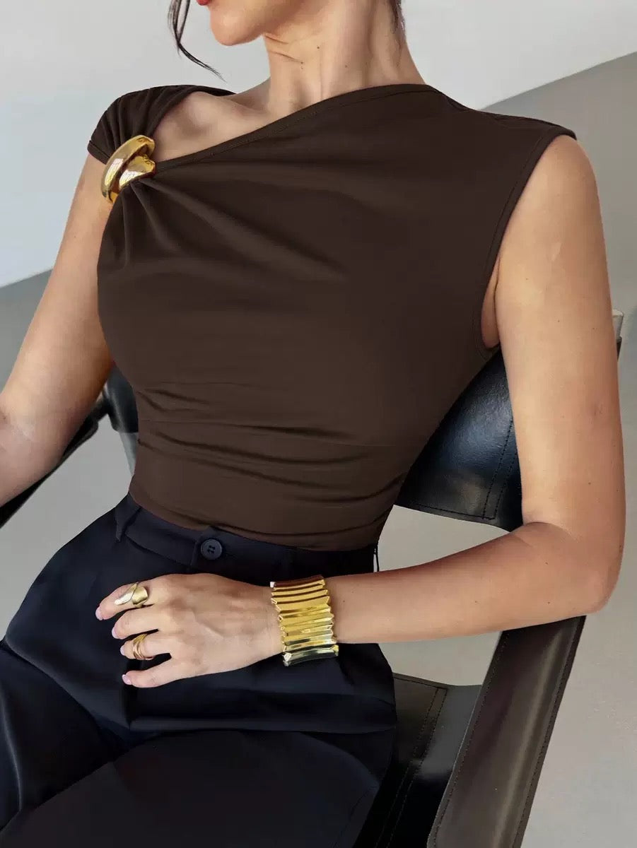 Top with metal accessories