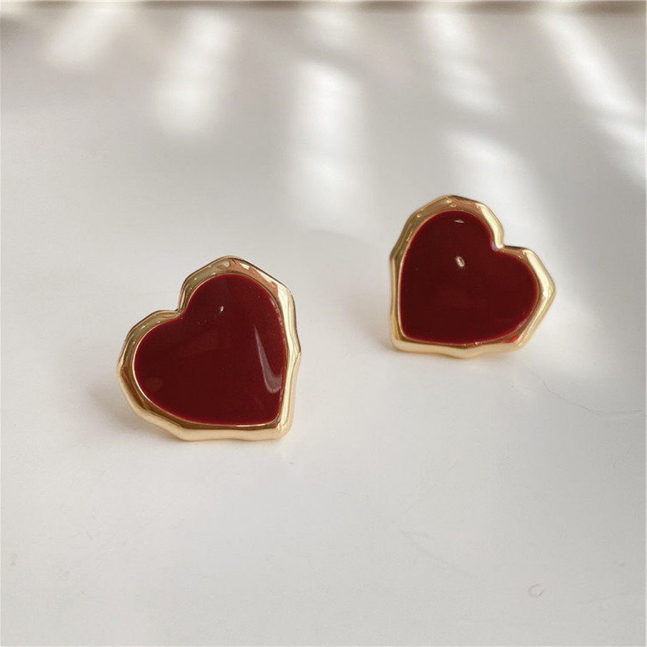 Heart burgandy earrings