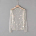 Embroidery mesh top