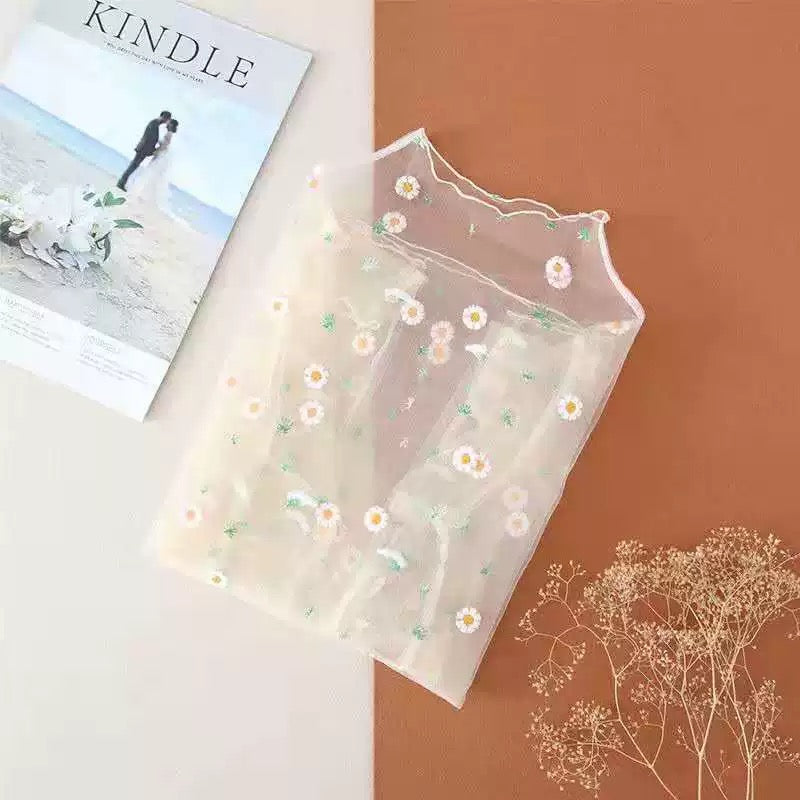Embroidery mesh top