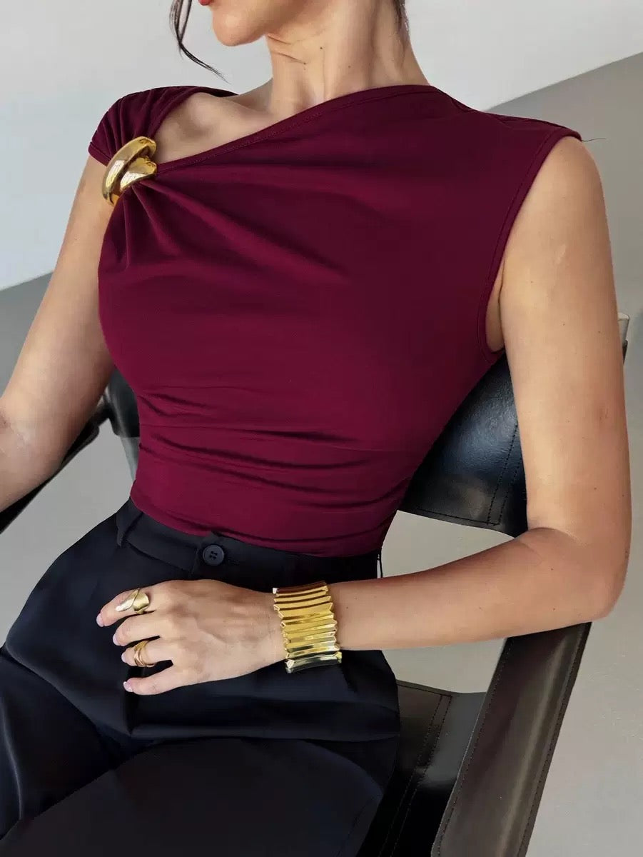 Top with metal accessories